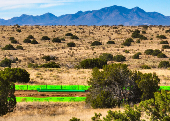 High desert landscape and Sangre de Cristo mountains at Esencia de Santa Fe Santa Fe New Mexico