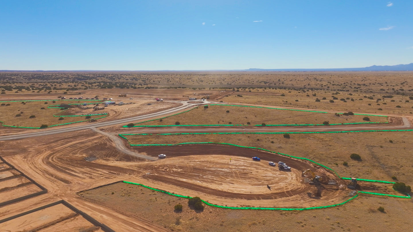Drone view of master planned community construction progress at Esencia de Santa Fe in Santa Fe New Mexico